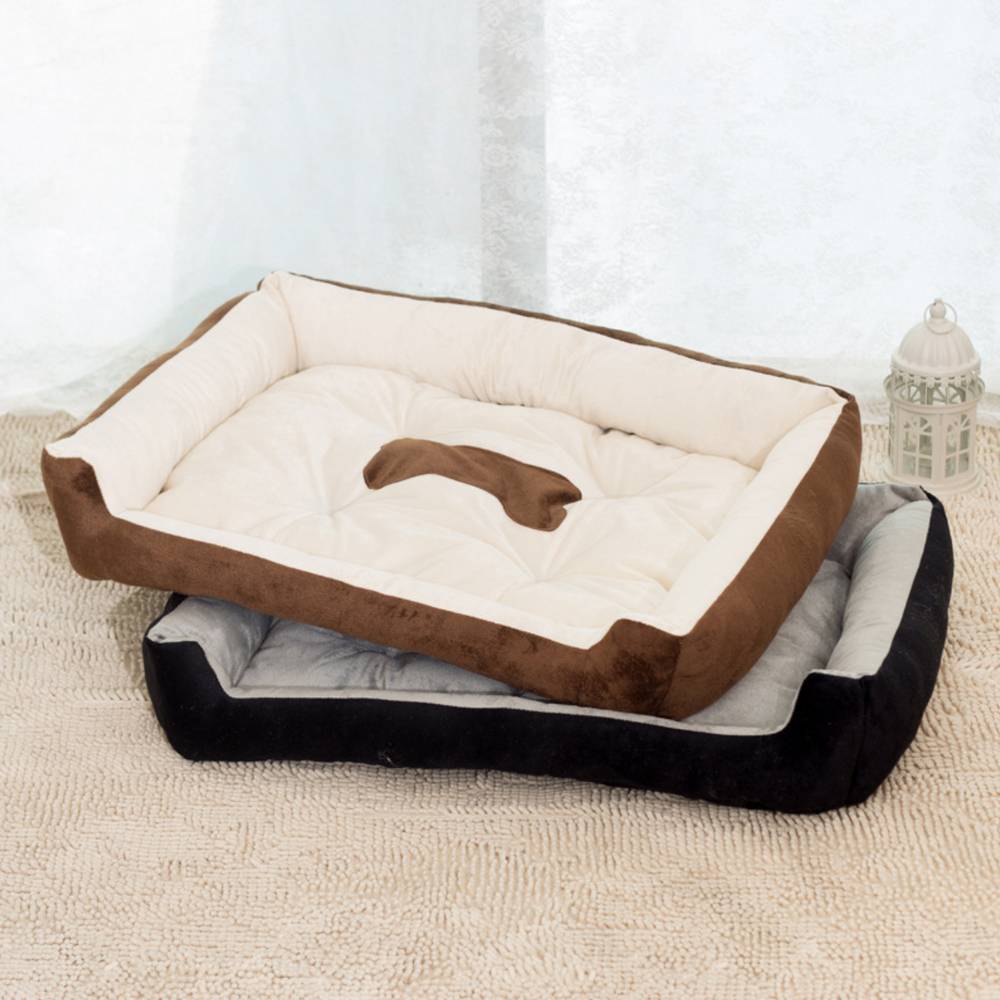 Calming plush bolster dog bed with a washable cover