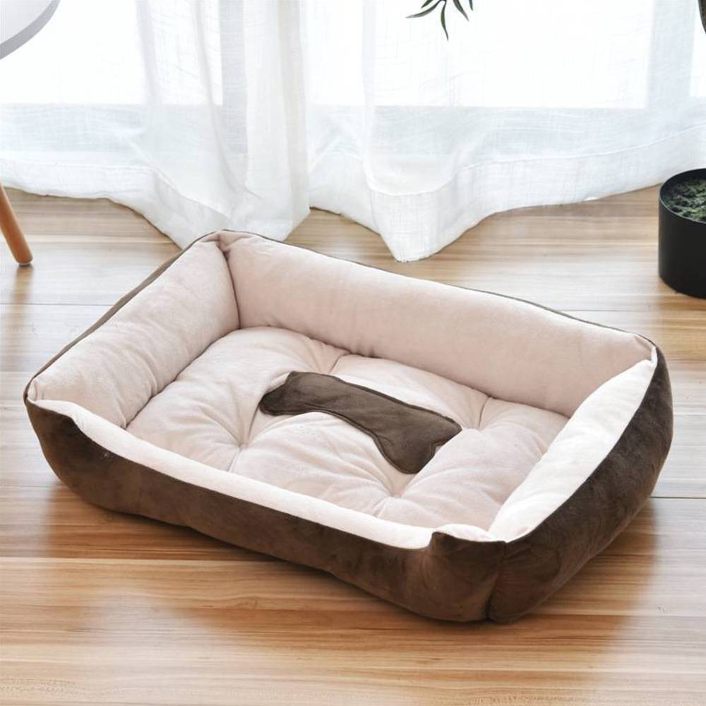 Calming plush bolster dog bed with a washable cover