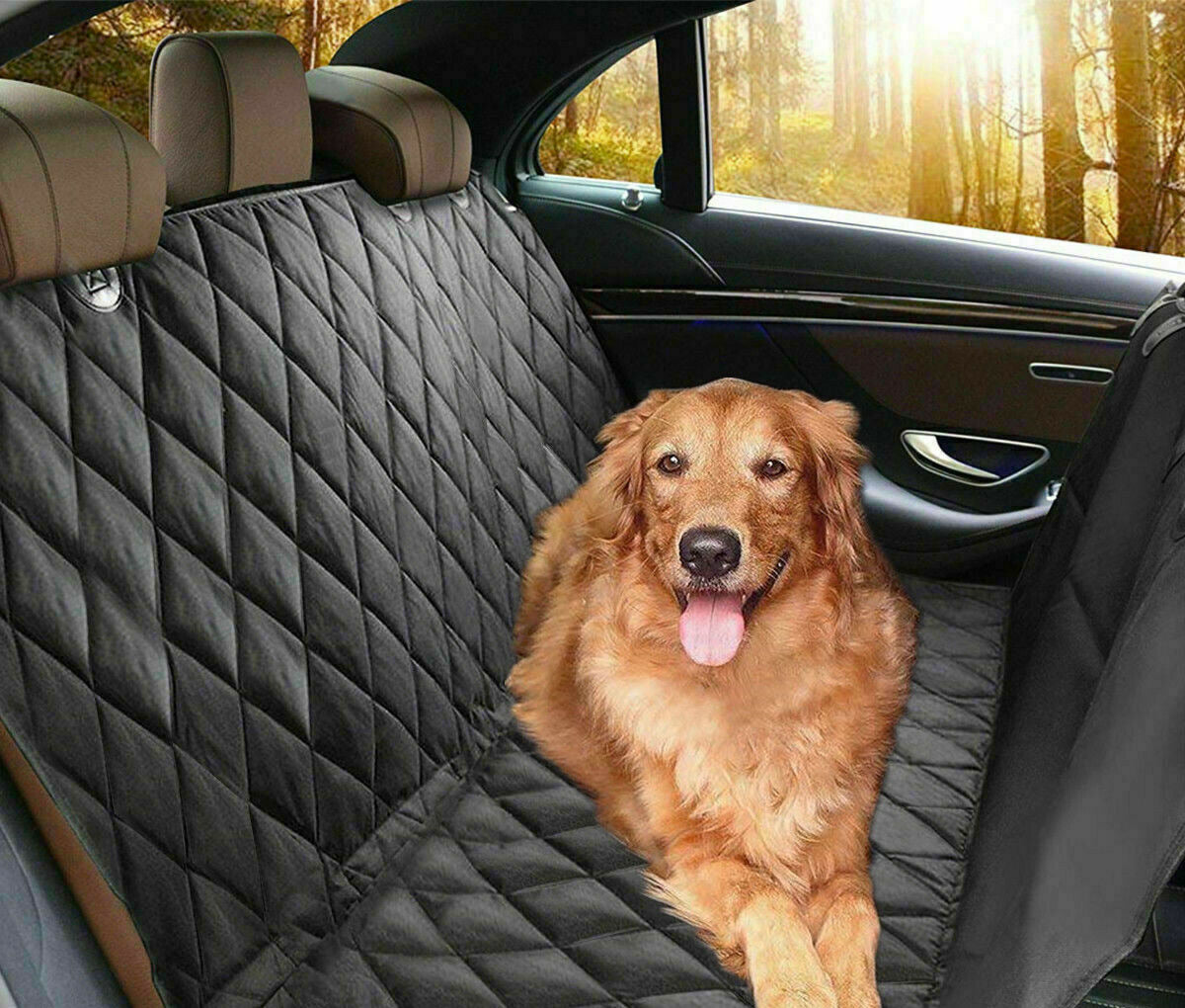 Golden retriever sitting on a black quilted dog car seat cover in the back of a car